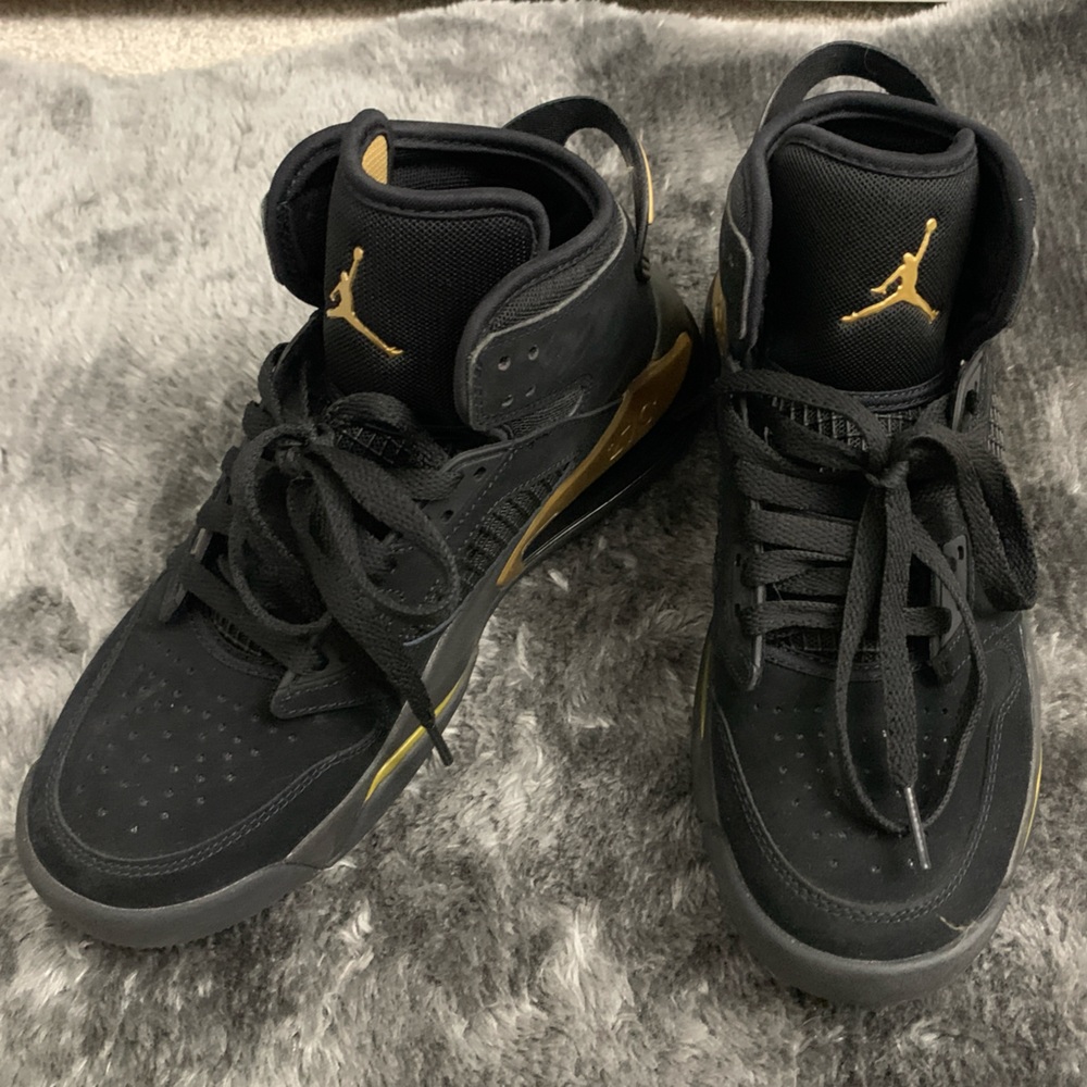 Nike Air Jordan black gold shoes